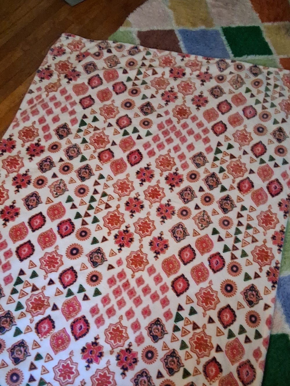 Jessica Simpson White Bedding Throw with Pink, Orange and Green Medallion Print